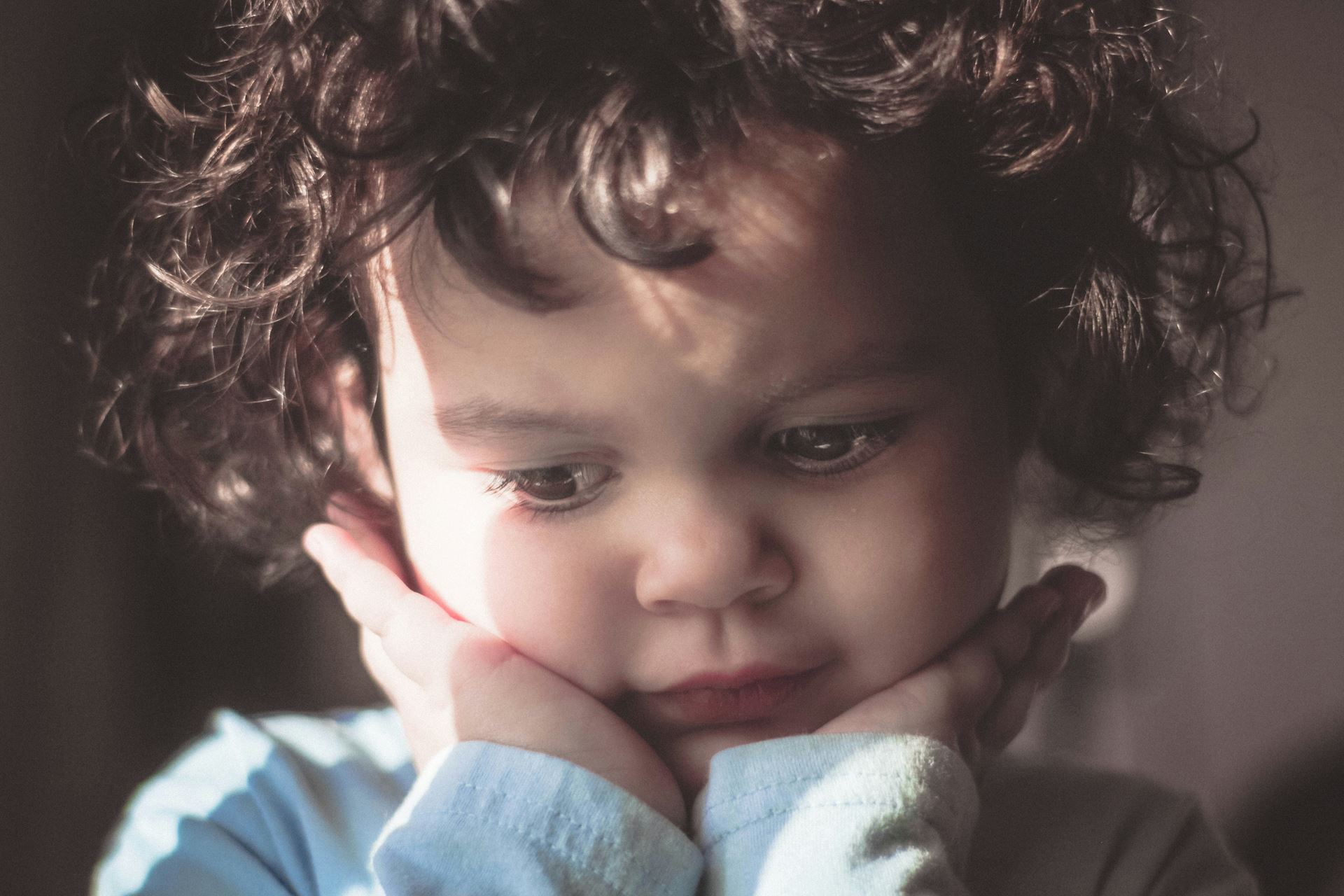 child with curly hair