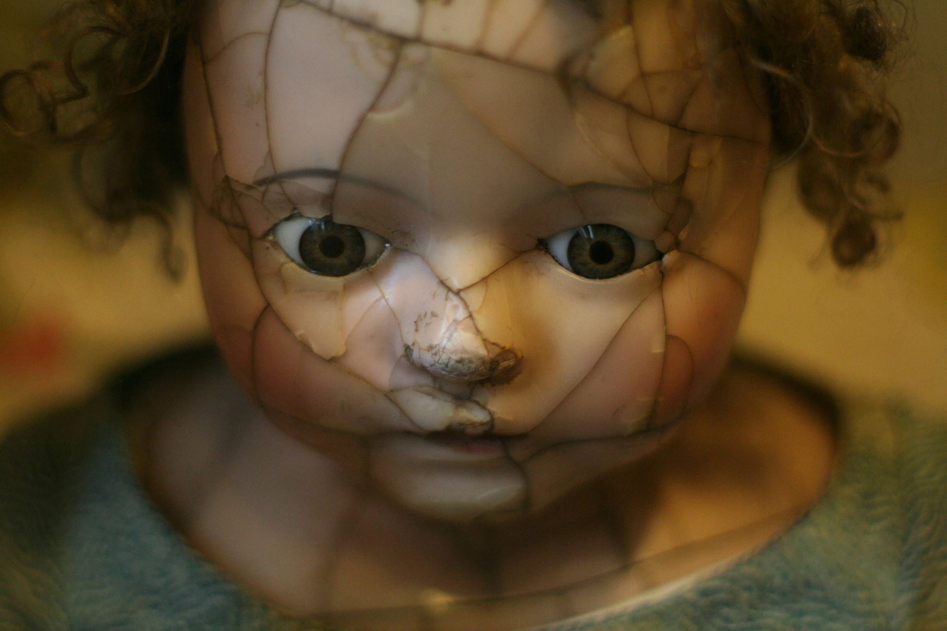 doll with cracked face